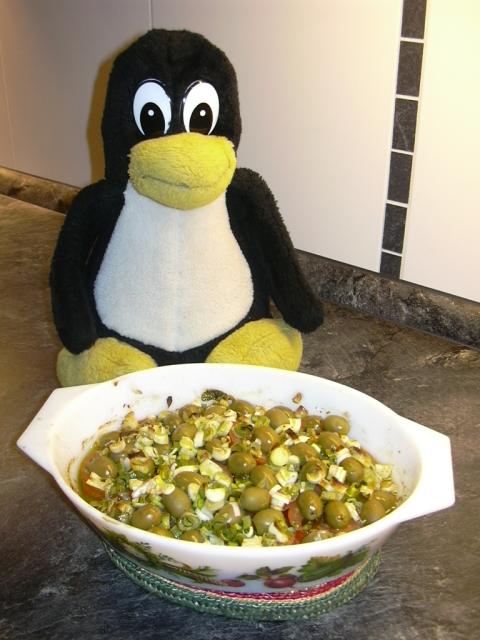 Tux mit dem Fischfilet